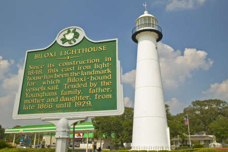 Biloxi Lighthouse and information sign in Biloxi, MSのeditorial素材