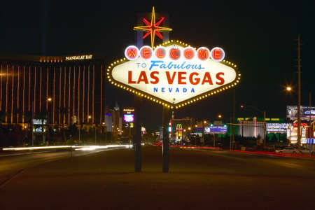 Colorful sign reads ÒWelcome to Fabulous Las Vegas, NevadaÓ at nightのeditorial素材