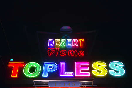 Topless neon sign advertising a strip club near Phoenix AZのeditorial素材
