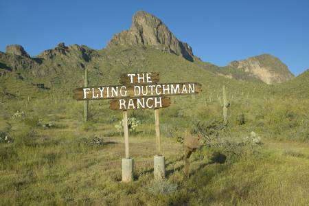 A sign directing travelers to the Flying Dutchman Ranch near Picacho Peak State Park North of Tucson, AZのeditorial素材
