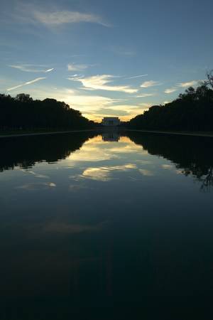 The Lincoln Memorial at Sunset with mirror image from reflecting pool in Washington D.C.のeditorial素材