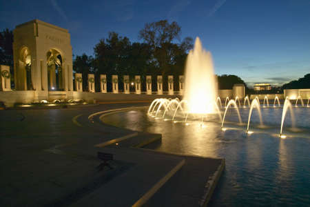 Fountains at the U.S. World War II Memorial commemorating World War II in Washington D.C. at duskのeditorial素材