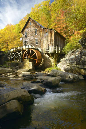 Glade Creek Grist Mil and autumn reflections and water fall in Babcock State Park, WVのeditorial素材