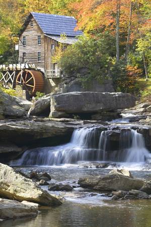 Glade Creek Grist Mil and autumn reflections and water fall in Babcock State Park, WVのeditorial素材