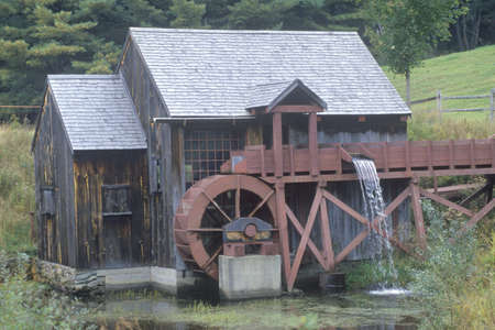 An old brown water mill in New England