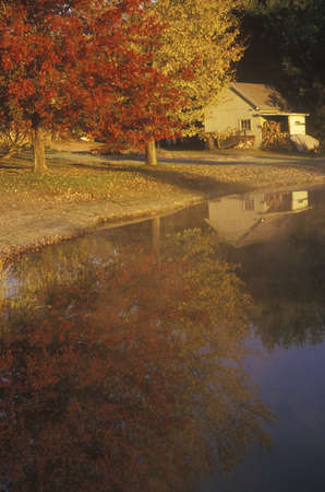 Autumn Trees Reflected in Water, Connecticutのeditorial素材