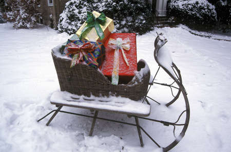 Sleigh With Presents on Lawn, St. Louis, Missouriのeditorial素材