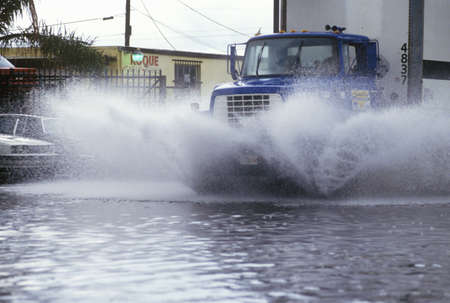 Truck Driving Through Flooded Street, Miami, Floridaのeditorial素材