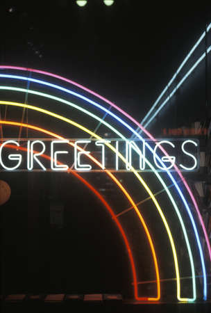 A neon sign that reads "Greetings" in Los Angeles, Californiaのeditorial素材