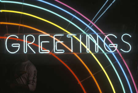 A neon sign that reads "Greetings" in Los Angeles, Californiaのeditorial素材