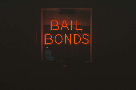 A neon sign that reads "Bail Bonds"のeditorial素材
