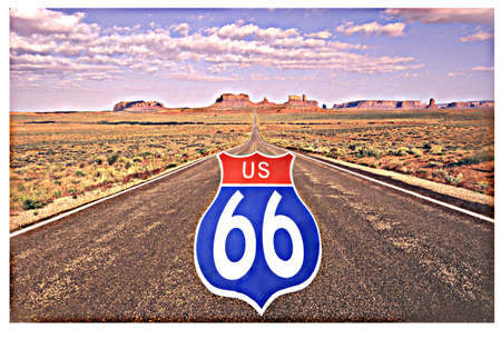 This is a digitally composed image with a US 66 road sign superimposed on the road to Monument Valley. There is a desert landscape surrounding the road.のeditorial素材