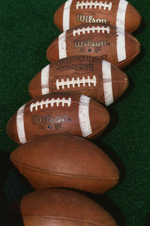 This is a group of footballs used at the West Point Military Academy. Playing were the NY Army team vs. Lafayette at Michie Stadium.のeditorial素材