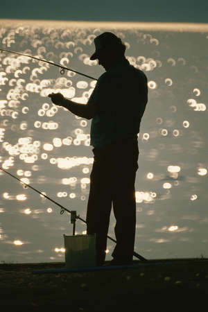 Fisherman on dockの写真素材