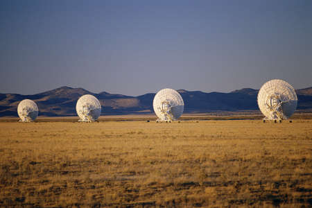 VLA Very Large Array radio telescope dishes scattered in field