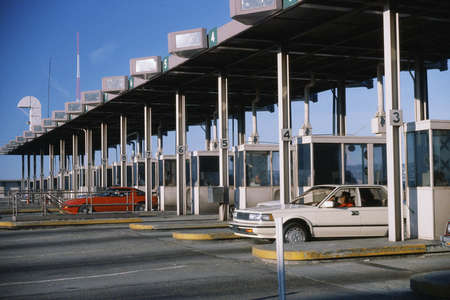 Cars emerging from toll booth