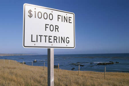 Sign with fines for litterの写真素材