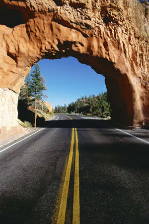 Red rock tunnel on highwayの写真素材