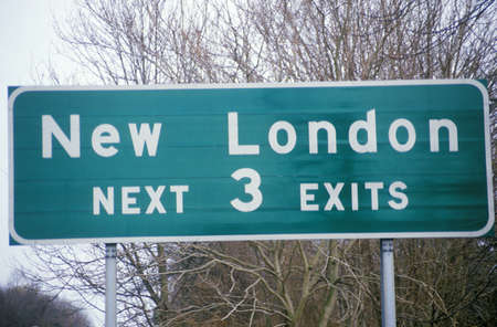 A sign that reads ÒNew London next 3 exitsÓのeditorial素材