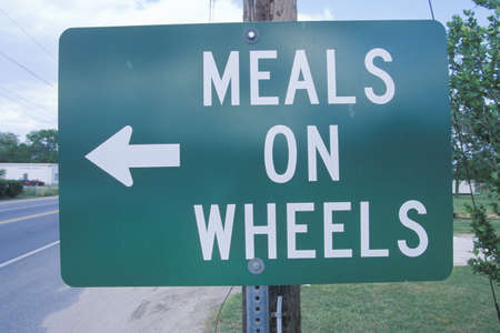 A sign that reads Òmeals on wheelsÓのeditorial素材