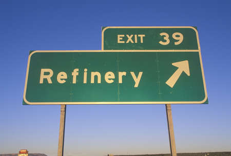 A sign that reads ÒExit 39 - RefineryÓ
