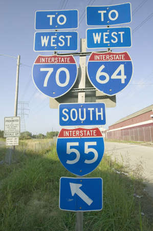 Interstate highway signs show the intersection of Interstate 70, 64 and 55 in East St. Louis near St. Louis, Missouriのeditorial素材