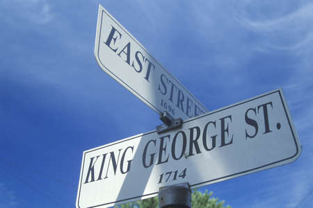 A sign that reads ÒKing George St./East StreetÓのeditorial素材