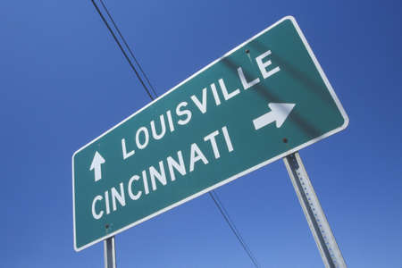 Freeway road sign to Louisville and Cincinnatiのeditorial素材
