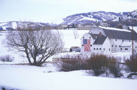 American Flag Hung on Barn in the snow, Park City, Utahのeditorial素材