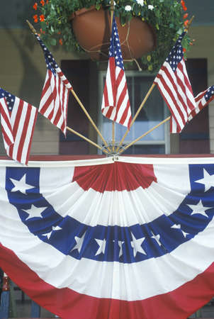 American Flags and bunting Hung on Porch of Houseのeditorial素材