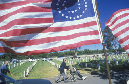 American Flags and Visitors at Los Angeles Cemetery, California