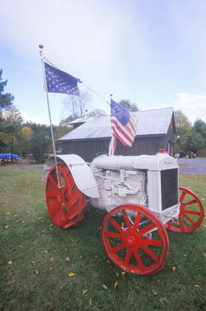 Antique tractor with American Flags, Upper Peninsula, Michiganのeditorial素材