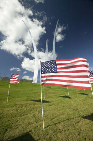 American flags at base of three soaring spires of the Air Force Memorial at One Air Force Memorial Drive, Arlington, Virginia in Washington D.C. areaのeditorial素材