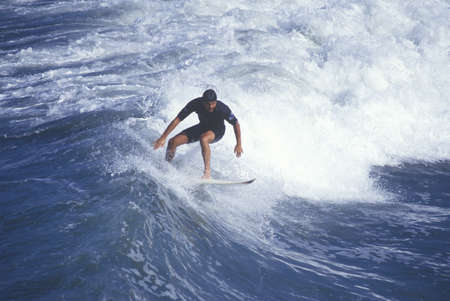 Surfer on crest of wave, Huntington Beach, CAのeditorial素材