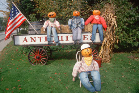 Halloween Pumpkin Characters Sitting on Wagon and Lawn, New Englandのeditorial素材