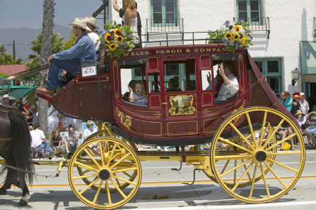 Stagecoach during opening day parade down State Street, Santa Barbara, CA, Old Spanish Days Fiesta, August 3-7, 2005のeditorial素材