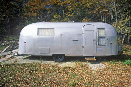 An old air steam trailer parked in Maineのeditorial素材