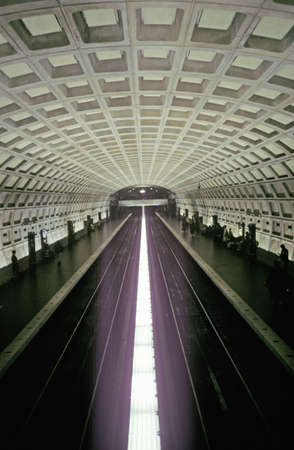 An underground subway platform for the Metro Rail mass transit system in Washington, D.C.のeditorial素材