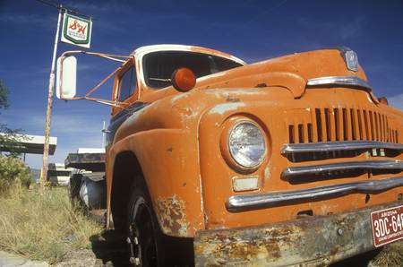 An old orange truck roadside off of Route 66 Arizonaのeditorial素材
