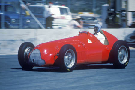 An Alfa Romeo Milano red car racing at the 35th Concours D' Elegance Show in Pebble Beach Carmel, CAのeditorial素材