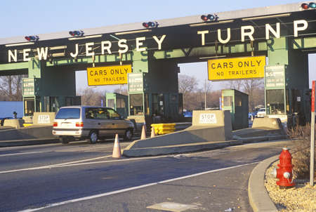 Cars waiting to pass the New Jersey Turnpike Tollboothのeditorial素材
