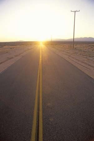 A highway during sunset in Mojave, Californiaのeditorial素材