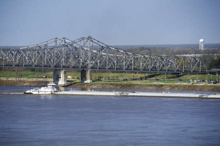 A barge in the Mississippi River in Vicksburg, Mississippiのeditorial素材