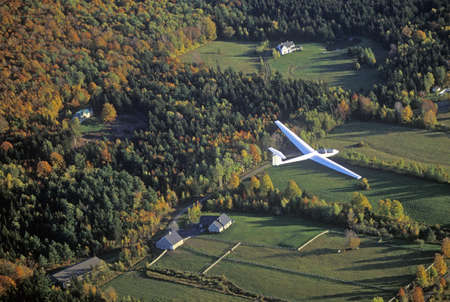 An aerial glider flies over Warren, Vermont in autumnのeditorial素材