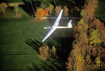 An aerial glider flies over Warren, Vermont in autumnのeditorial素材