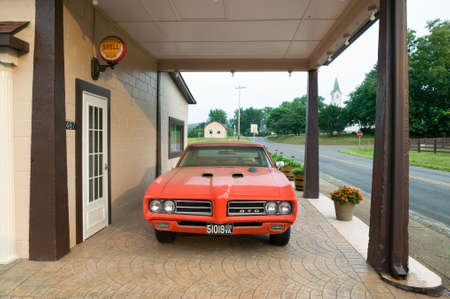 Parked Pontiac GTO at old Shell station in Orange County, Virginiaのeditorial素材