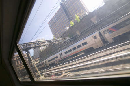 View of Philadelphia skyline from moving Amtrak train, Philadelphia, Pennsylvaniaのeditorial素材