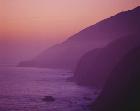 Purple sunset along Pacific Coast Highway, Californiaのeditorial素材