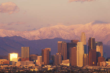 Sunset view of Mount Baldy and Los Angeles from Baldwin Hills the day after a winter storm, Los Angeles, Californiaのeditorial素材