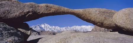 Panoramic view of Mount Whitney framed through Alabama Hills Arch in Alabama Hills near Lone Pine, Californiaのeditorial素材